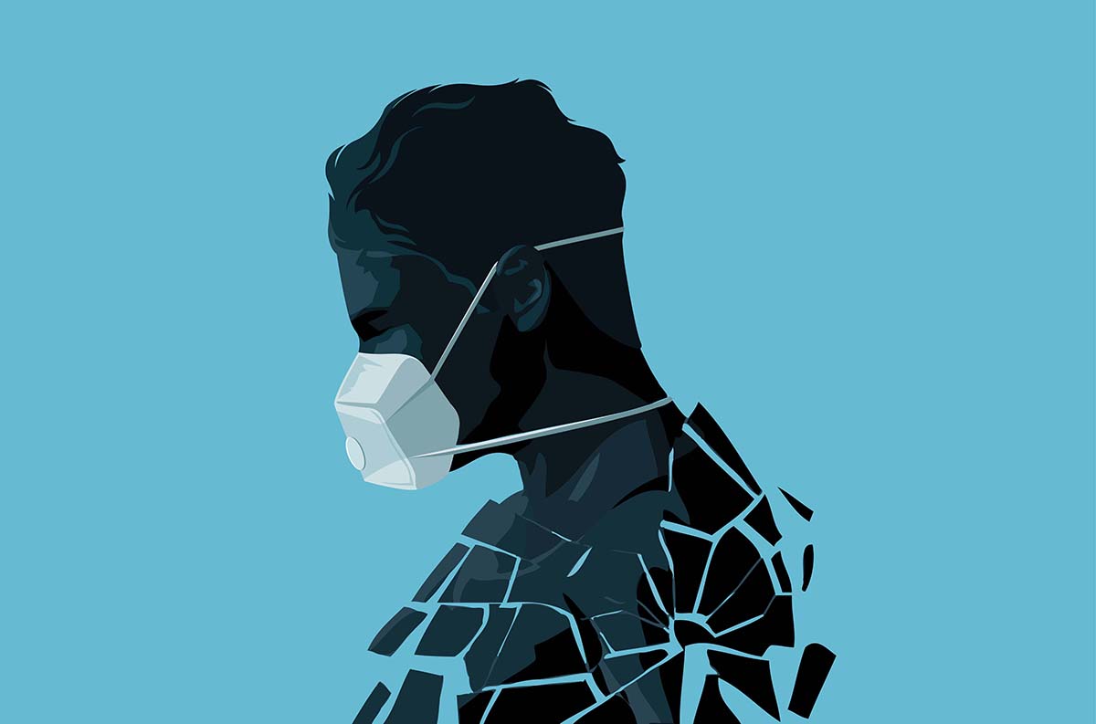 A fractured self isolated man wearing a face mask in the Covid-1