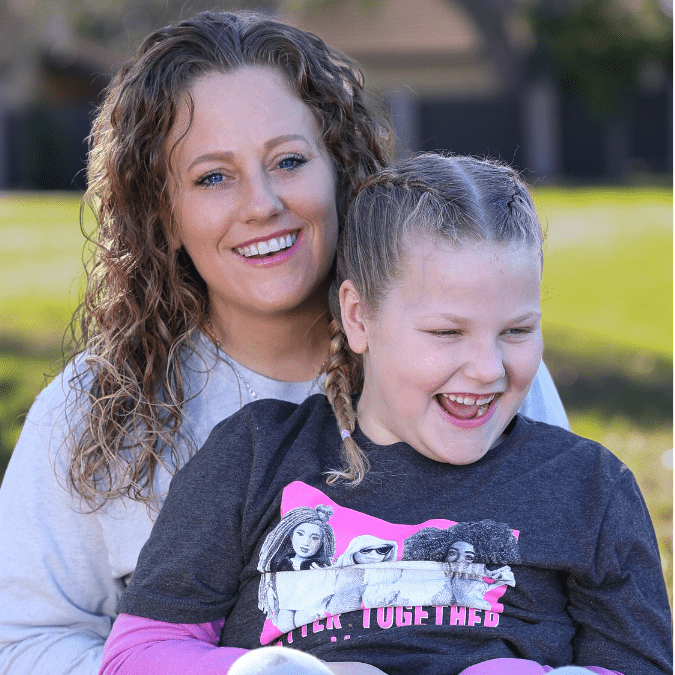 Barb and her daughter Alyssa smiling together after rebuilding their lives through Harvest House
